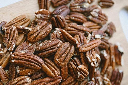 Toast pecans before dipping in chocolate